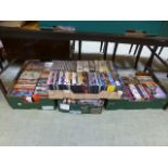 Four trays of DVDs