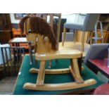 A pine rocking horse