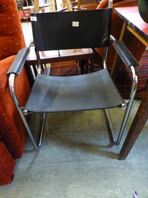 A 1970's black leather and chromed chair