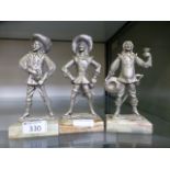 Three pewter figures of musketeers