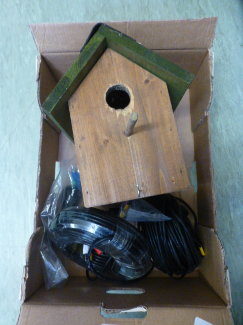 A bird box with internal camera and cabl