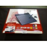 A boxed Genius ultra slim tablet