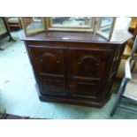 A reproduction rosewood effect two door