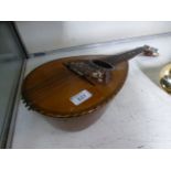 An early 20th century mandolin with pape