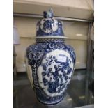 A blue and white Chinese style lidded ba