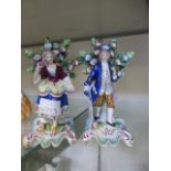 A pair of 19th century porcelain figures