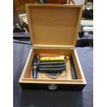 A Vegafina humidor together with other s