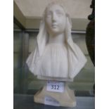 A carved alabaster bust of a veiled lady