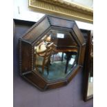 An early 20th century oak framed octagon