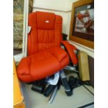An 'as new' red leather office chair in