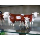 A family of Beswick Hertfordshire cattle