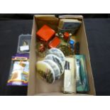 A box of assorted items to include colle