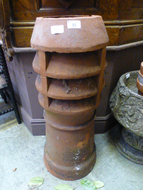 A terra cotta chimney pot