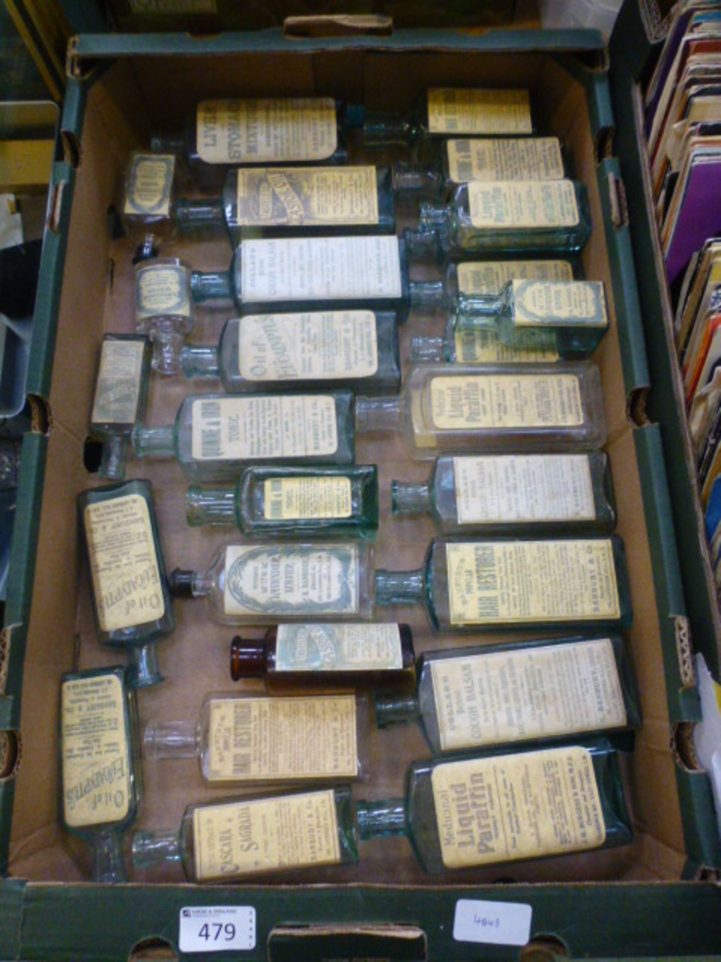 A tray containing a quantity of old toni