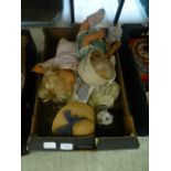 A tray containing child's dolls