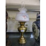 A brass bodied oil lamp having an opaque