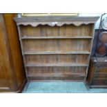 A 19th century pine plate rack