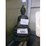 A small bronze Buddha