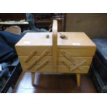 A beech cantilever sewing box with conte