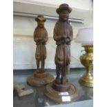 Two continental carved oak figures of 17