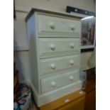 A white painted chest of four drawers