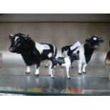 A family of Beswick Friesian cattle