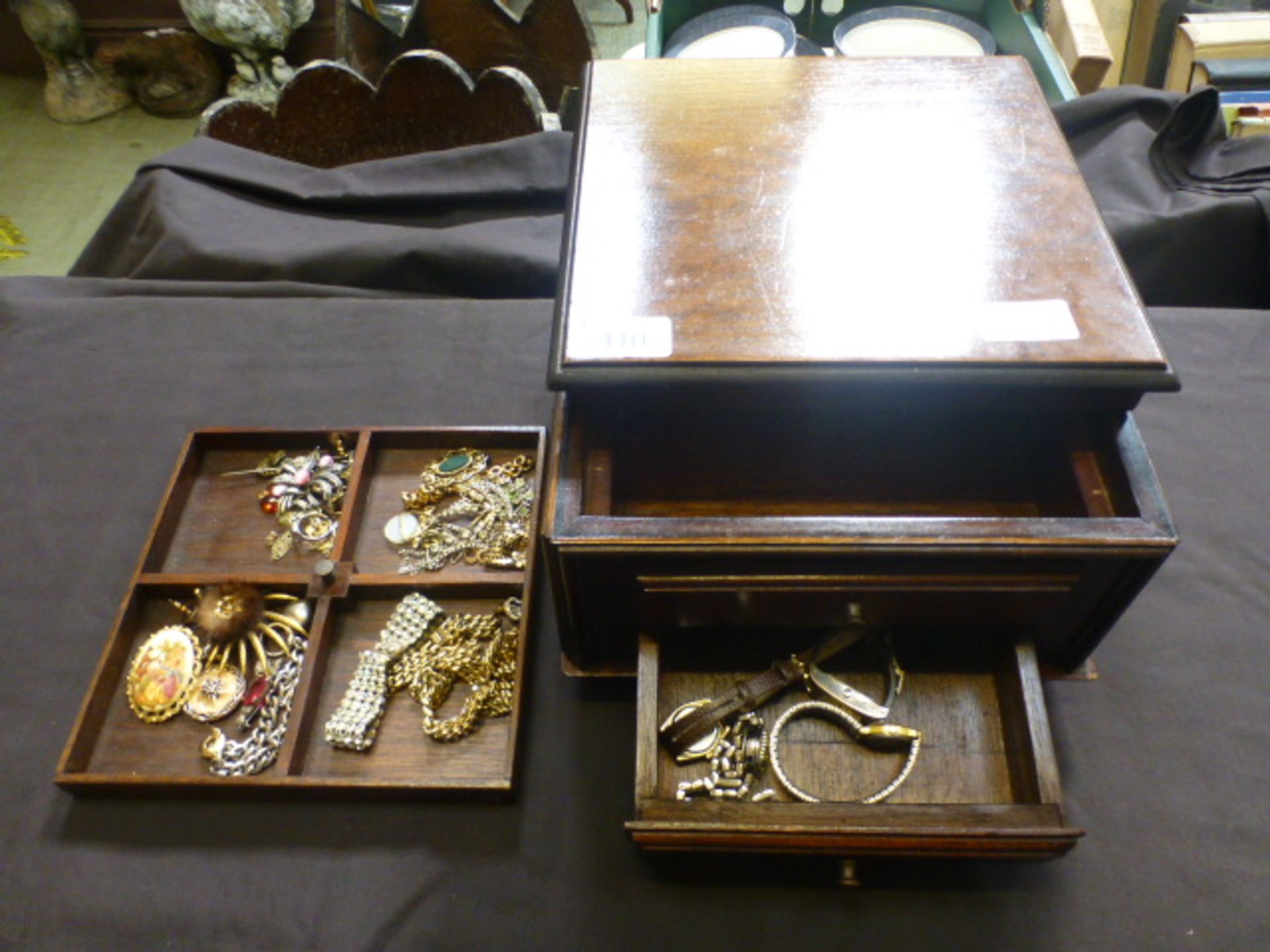 A jewellery box containing an assortment