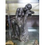 A bronze resin sculpture of a nude lady