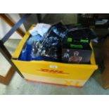 A box of as new garments to include boxe