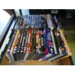 A tray containing a quantity of DVDs