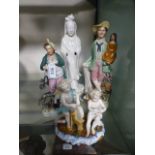 A collection of ceramic figures to inclu