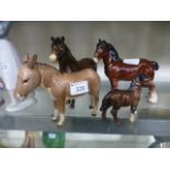 Two Beswick Donkeys together with a Besw