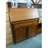 A modern teak bureau