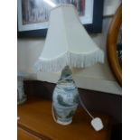 A table lamp with ceramic base