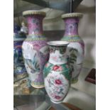 A pair of Chinese Famille Rose vases dec