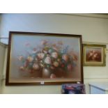 A framed oil on board of still life with