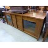 A modern oak sideboard with four drawers