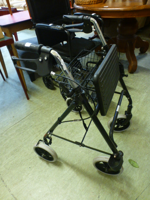 A four wheeled walking aid