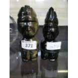 Two carved African stone figures