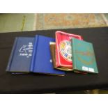 A quantity of stamp albums etc.