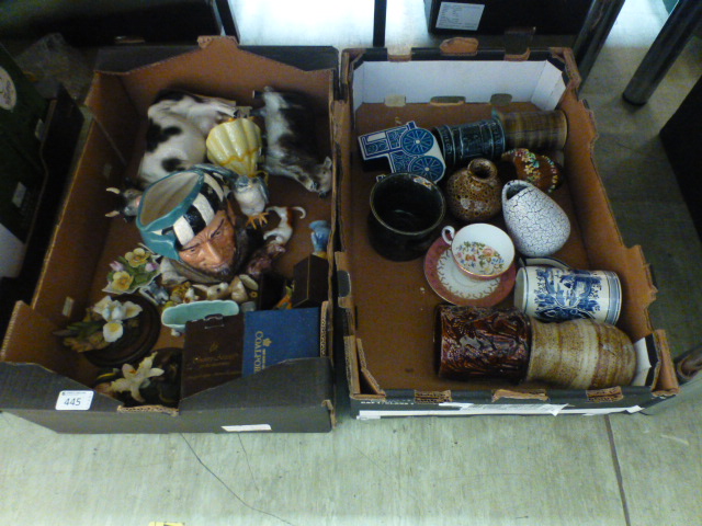 Two trays of ceramic ware to include Roy