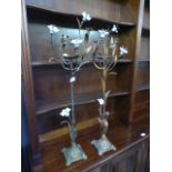 Two modern metalwork candle holders