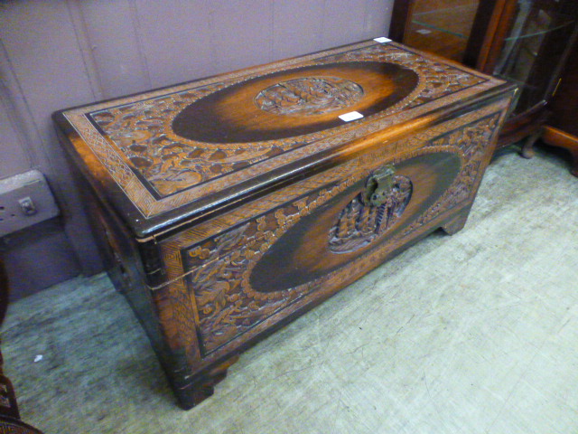 A Chinese carved ottoman