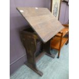 An early 20th century oak artists desk w