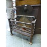 A cast iron fire basket