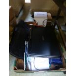 A tray containing an Acer laptop, keyboa