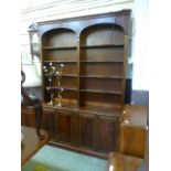 A reproduction mahogany bookcase having