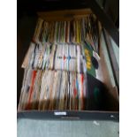 A tray of 45rpm records by various artis