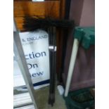 A set of chimney sweep rods and brush