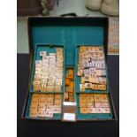 A leather cased mahjong set